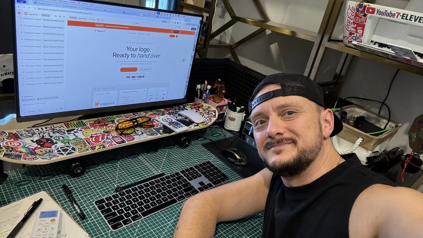 Iggy, founder of Logopack, at his desk working on the app.